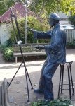 The bronze artist at the easel -eternally creating.